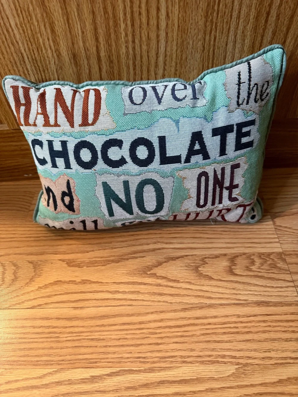 Tapestry decor pillow with phrase: HAND over the CHOCOLATE and NO ONE gets hurt